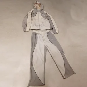 Custom Logo Printed Men’s Windbreaker Sport Suit Two Piece Wind Jacket and Track Pants Nylon Tracksuit Set